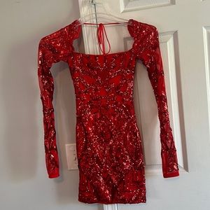 A fancy red dress from Lucy in the Sky. Is an XS but fits like an XXS.